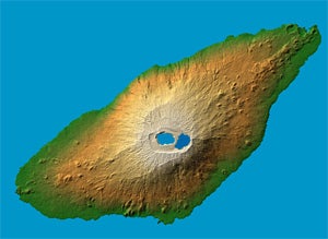 Ambae Island, Vanuatu: Last active in 1996, the 1,496 meter (4,908 ft.) high basaltic shield volcano features two lakes within its summit caldera, or crater. The ash and gas plume is actually emerging from a vent at the center of Lake Voui (at left), which was formed approximately 425 years ago after an explosive eruption. Image Credit: NASA/JPL/National Geospatial-Intelligence Agency