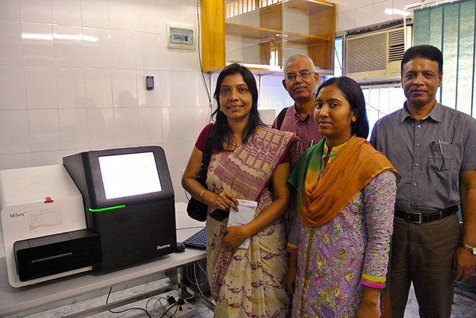 Prof. Laila Banu (center) and Next Generation Sequencer (left) in her laboratory Prof. Laila Banu (center) and Next Generation Sequencer (left) in her laboratory