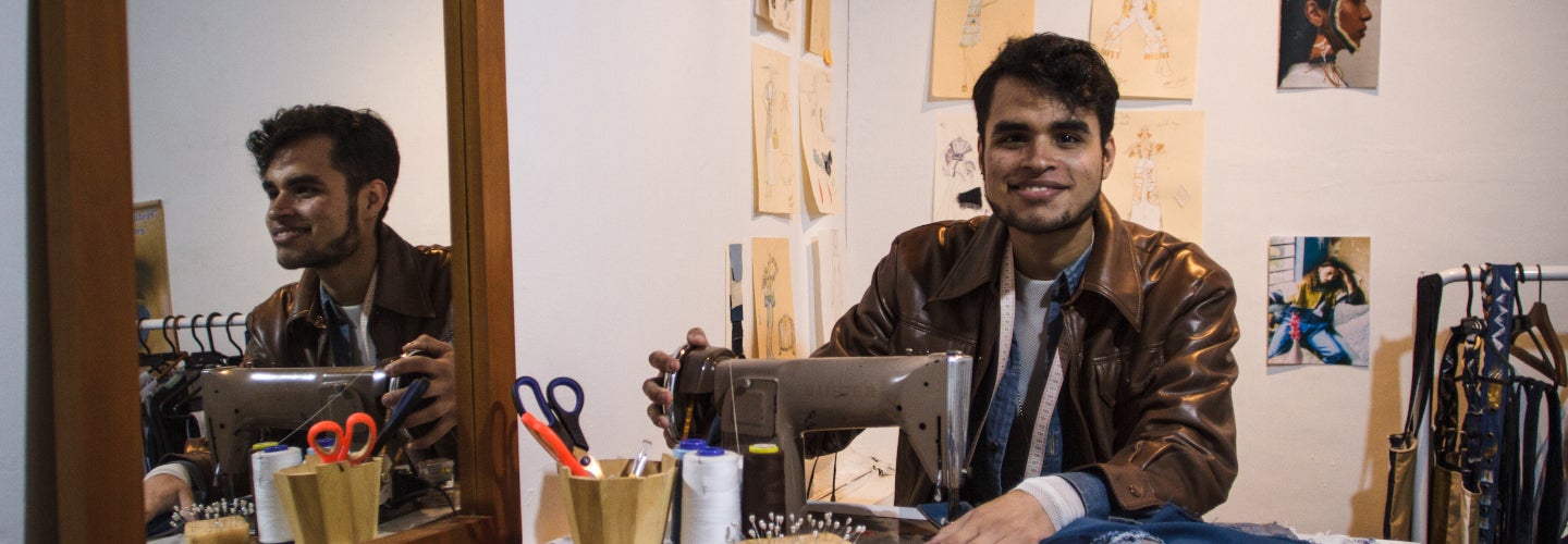 Ricardo Ali Castro, a Venezuelan migrant in Bogotá who dreams of becoming a fashion designer, launched his own firm two years ago. Photo: Helkin Rene Diaz/World Bank Ricardo Ali Castro, a Venezuelan migrant in Bogotá who dreams of becoming a fashion designer, launched his own firm two years ago. Photo: Helkin Rene Diaz/World Bank