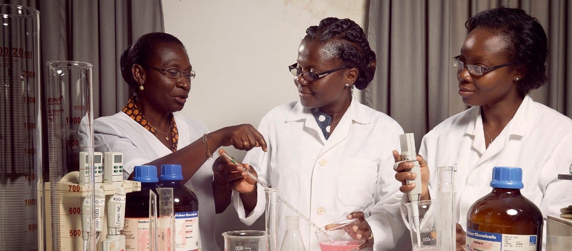 Professor Amivi Kafui Tete-Benissan (left) teaches cell biology and biochemistry at the University of Lomé