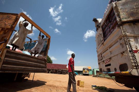Traders wait with loaded trucks in El Geneina, West Darfur, a few kilometers from the Sudan-Chad border. Photo by Albert González Farran, UNAMID.