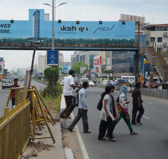 Pedestrians Prefer to Cross Streets in an Unsafe Way Rather than Take the Foot over-bridge. Credit: M. Karunakaran