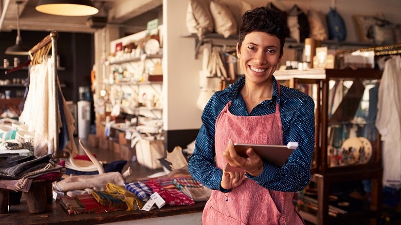 Portrait Of Female Owner Of Gift Store With Digital Tablet