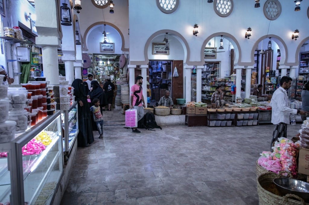 Food is available for those who can afford it at Souq Al-Handhal, an old market rehabilitated through a cash-for-work program in Seyoun. Photo credit: UNDP Yemen/2020