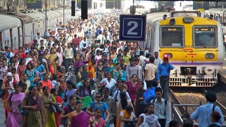 crowded train platform in South Asia.