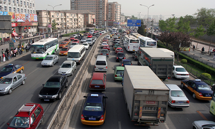 Rush hour traffic on a road in Beijing, China. - Photo: Shutterstock