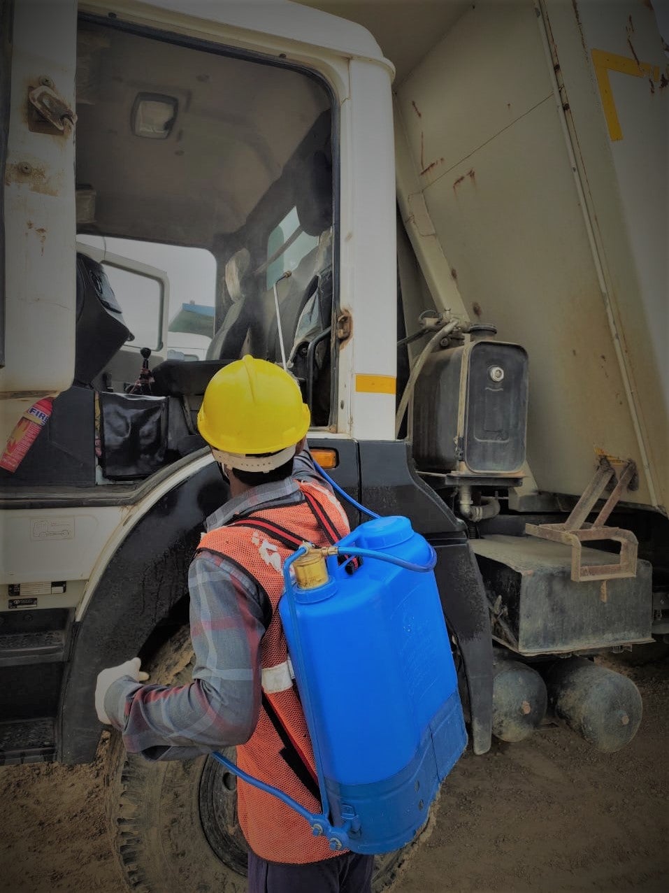 Vehicle being sanitized at the EDFC project site, India