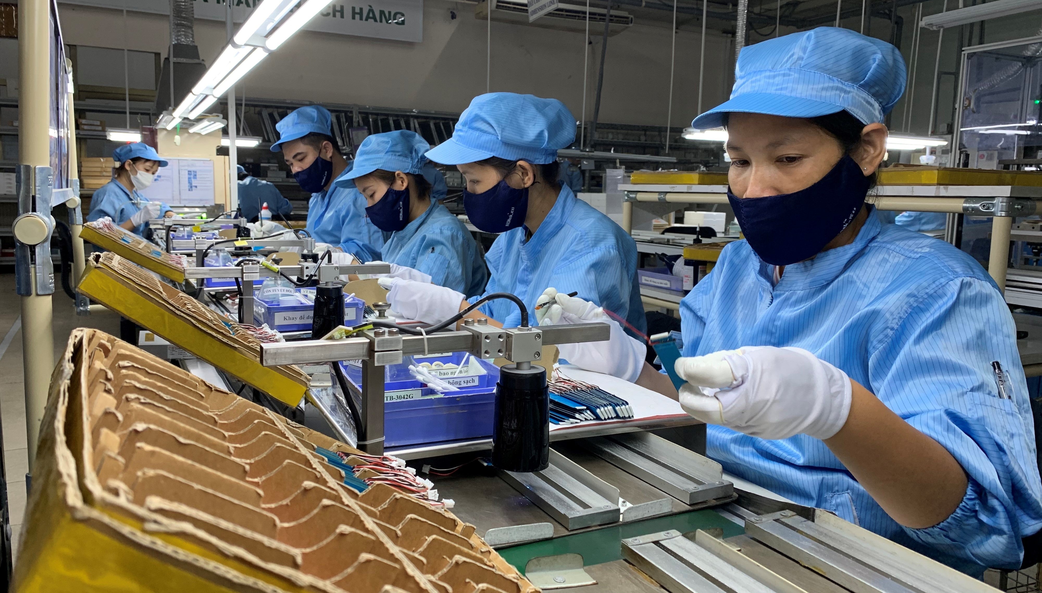 Workers checking electronic chips at Hanel PT factory in Hanoi, Vietnam. Photo: © Van Anh/IFC Workers checking electronic chips at Hanel PT factory in Hanoi, Vietnam. Photo: © Van Anh/IFC