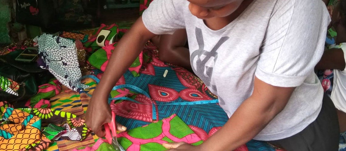 Female dressmaker in Monrovia, Liberia Female dressmaker in Monrovia, Liberia