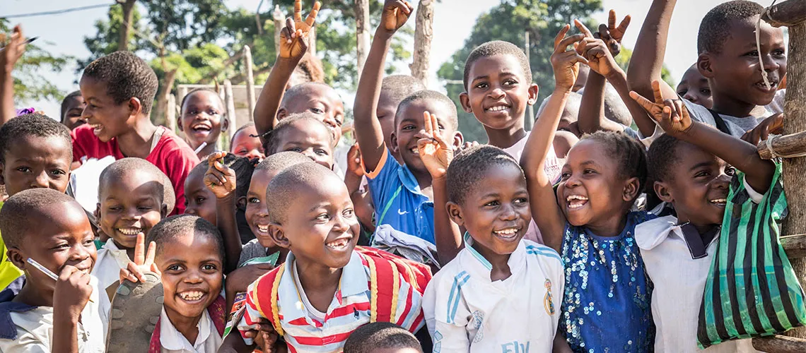 Children laugh out loud after morning class. Photo: Vincent Tremeau / World Bank