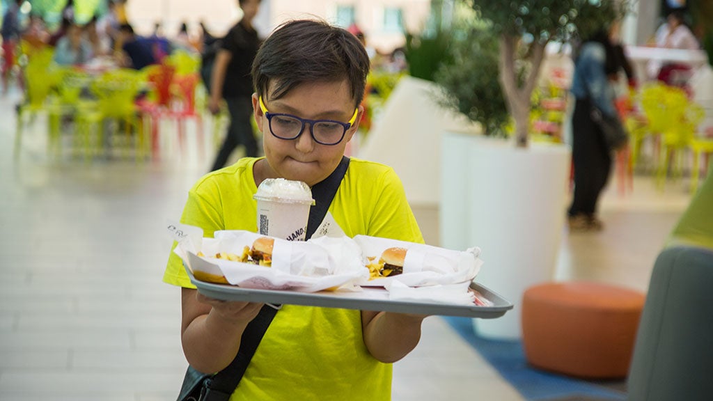 A boy with fast-food