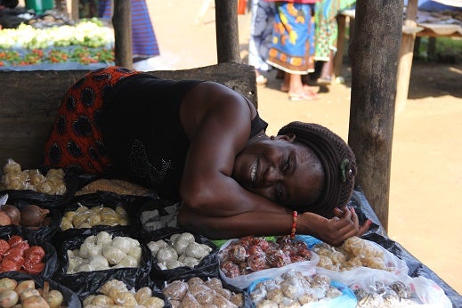Liberian woman's forest product market stand. © Gerardo Segura/World Bank Liberia Market Woman