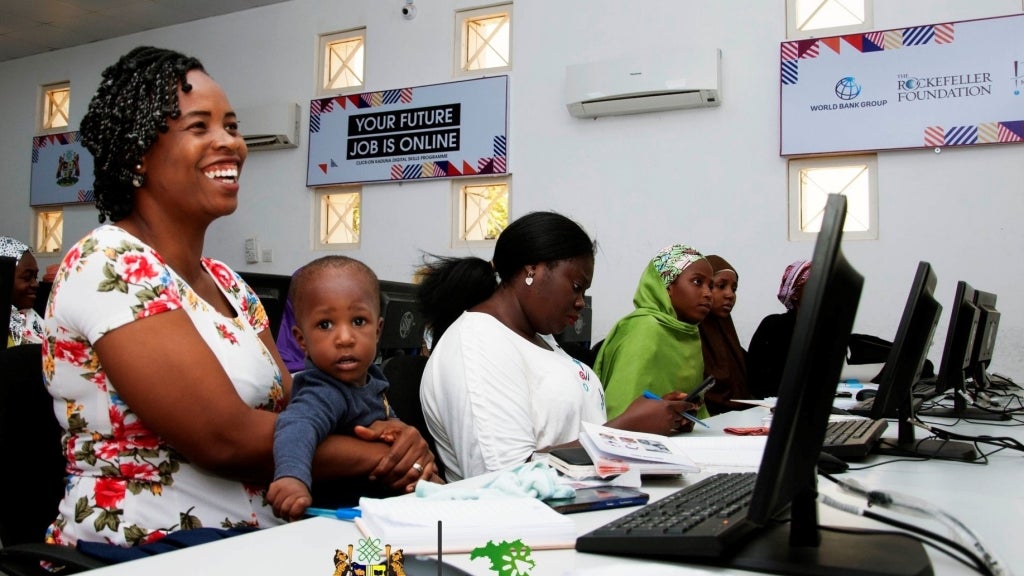 A participant and her son enjoying the Click-On Kaduna digital skills training program in Kaduna State, Nigeria. Photo: Click-On Kaduna Program.