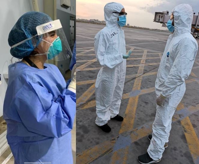 Women working in PPE at Kuwait Airport during coronavirus pandemic.