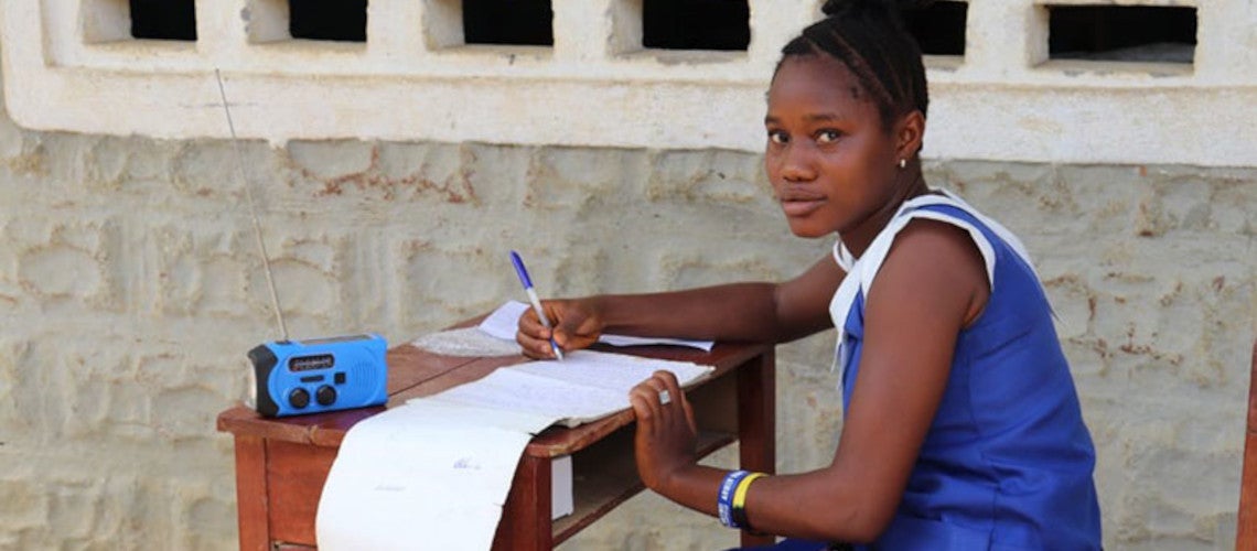 A student engaging with Sierra Leone's education radio program during COVID-19. Photo: Ministry of Basic and Senior Secondary Education A student engaging with Sierra Leone's education radio program during COVID-19. Photo: Ministry of Basic and Senior Secondary Education