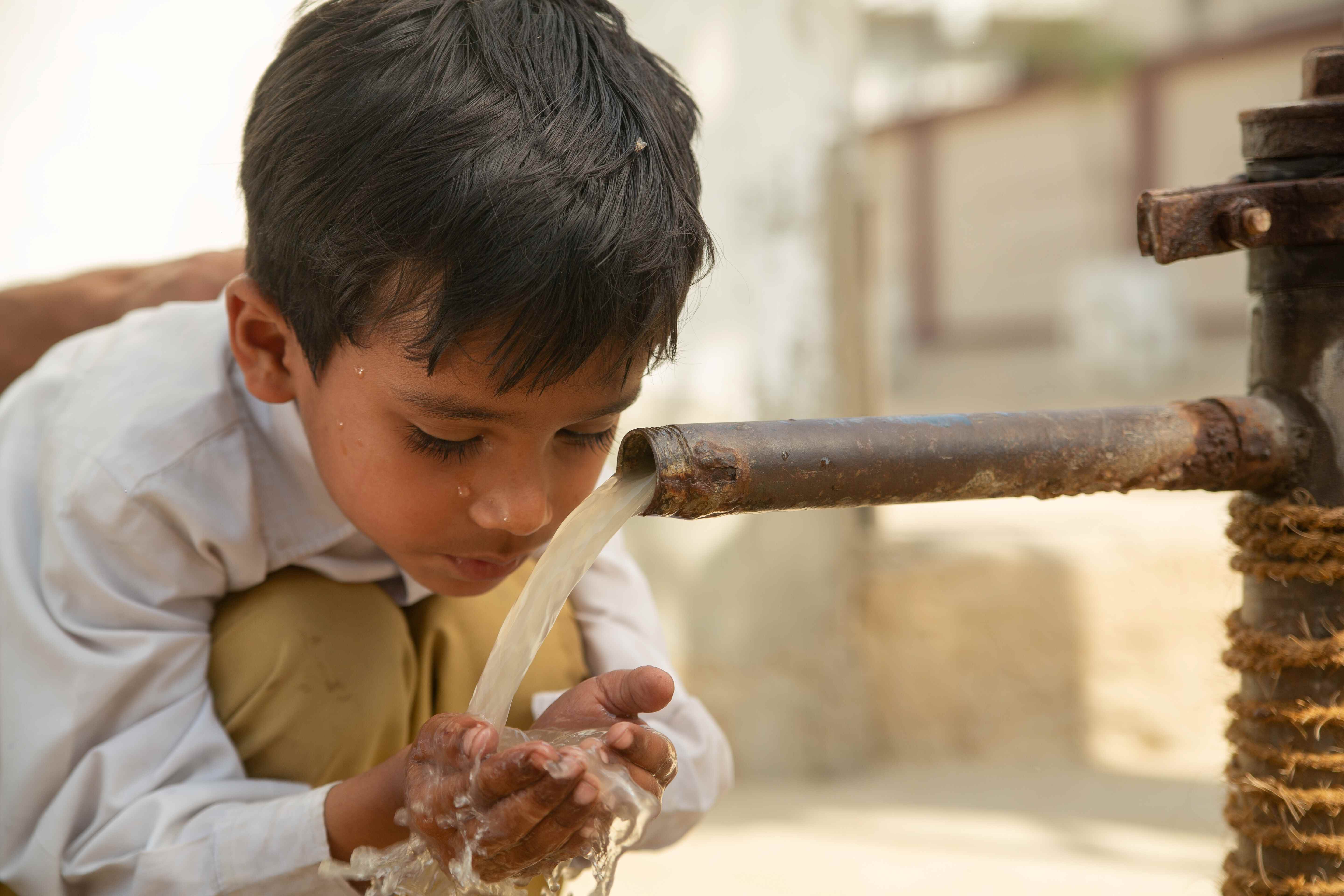 boy drinking water