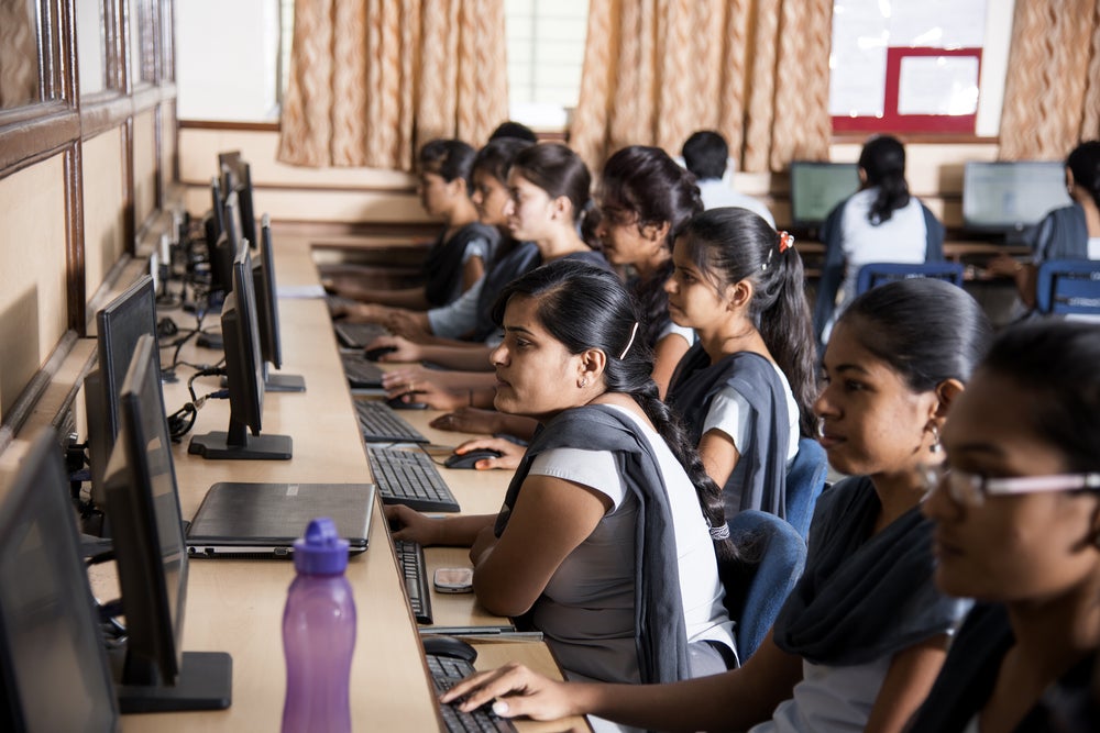 Young Information Technology students in India. Young Information Technology students in India.