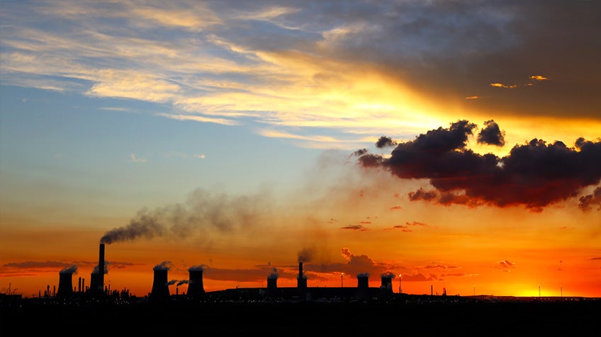 Sunset over industrial park