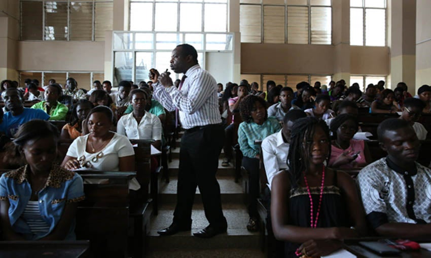 Teacher giving a lecture in class
