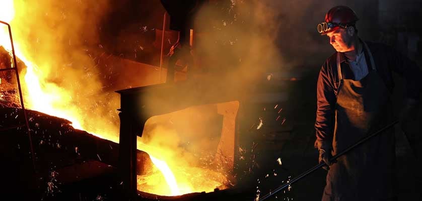 Liquid metal in the foundry, melting iron in furnace, steel mill.