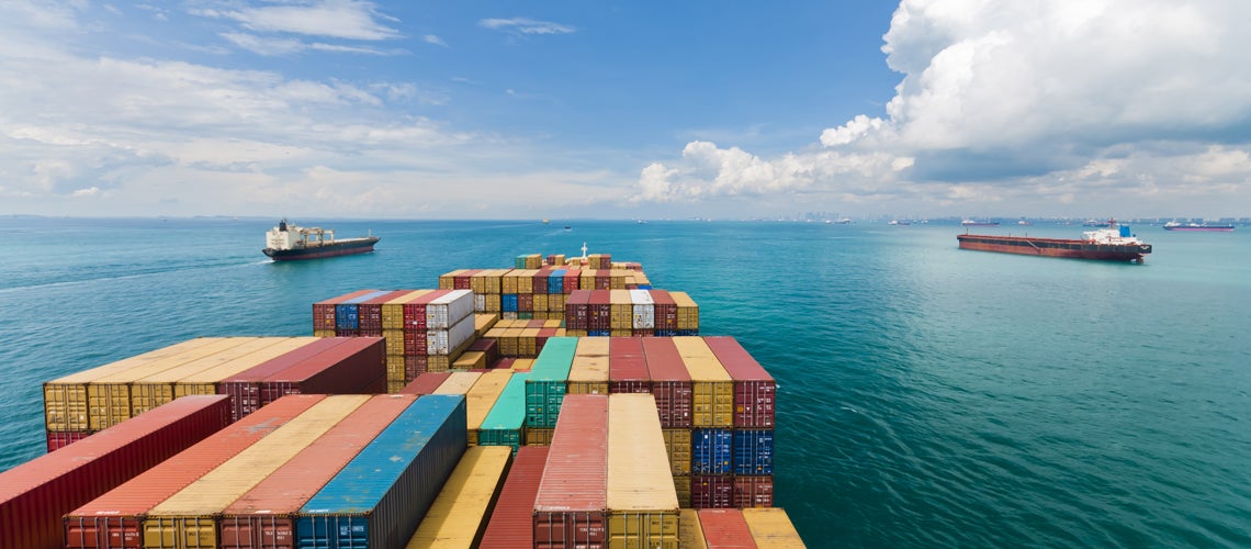 Cargo ships entering one of the busiest ports in the world, Singapore. Photo credit: Shutterstock.com Cargo ships entering one of the busiest ports in the world, Singapore. Photo credit: Shutterstock.com