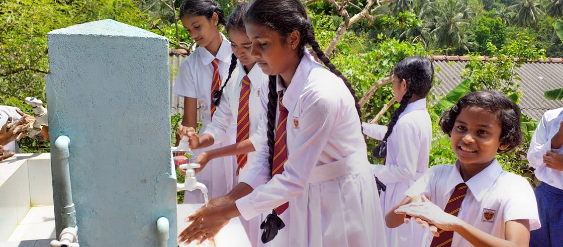 Students in Sri Lanka washing hands Students in Sri Lanka washing hands