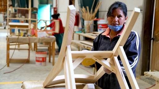 Image: Women working in a woodshop in Oaxaca, Mexico. 